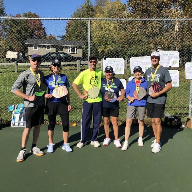 Group of pickleball players on the court