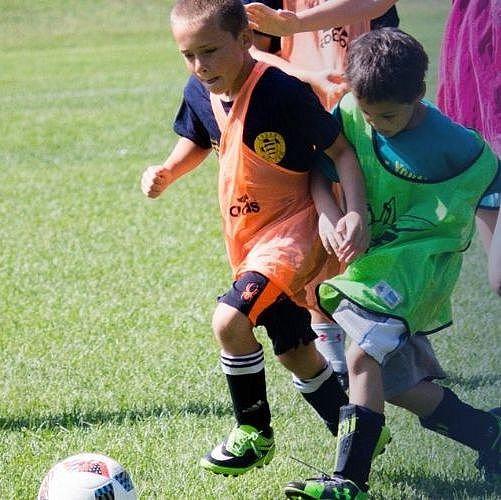 Children playing soccer